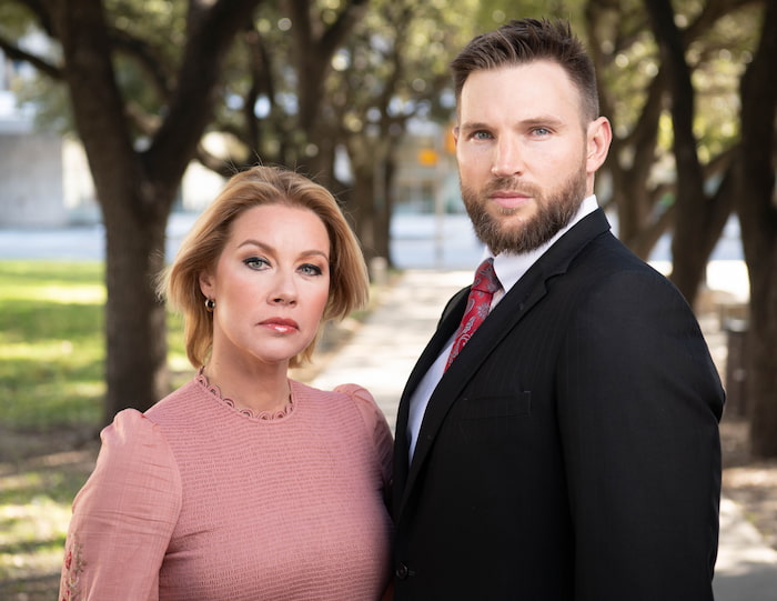 Lawyers Galina and Britton joint photo at a park.