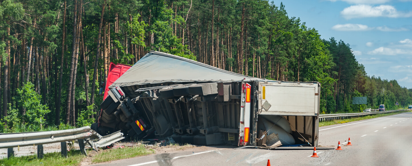 overturned truck on the road.