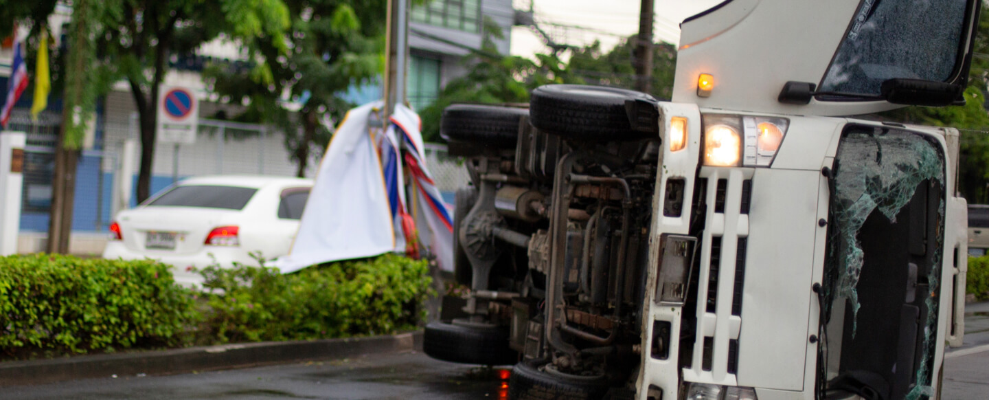 overturned vehicle on the road.